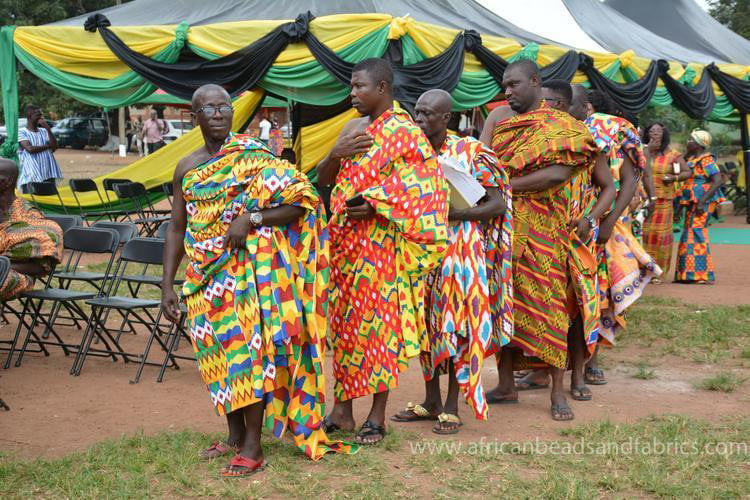 Men wearing kente